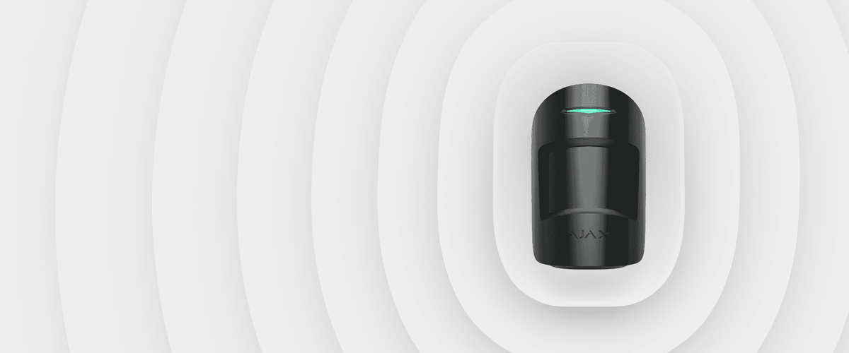 Ajax MotionProtect Plus Wireless Motion Sensor — Black shown in use