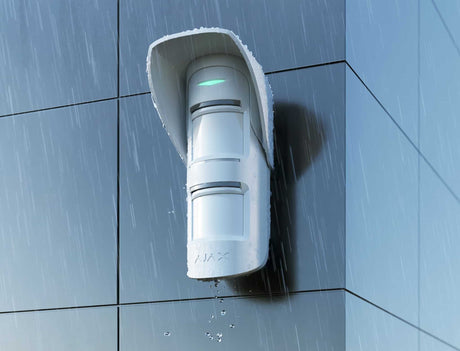 Ajax Hood for MotionProtect Outdoor shown in use