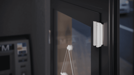 Ajax DoorProtect G3 Fibra Door Sensor — White shown in use