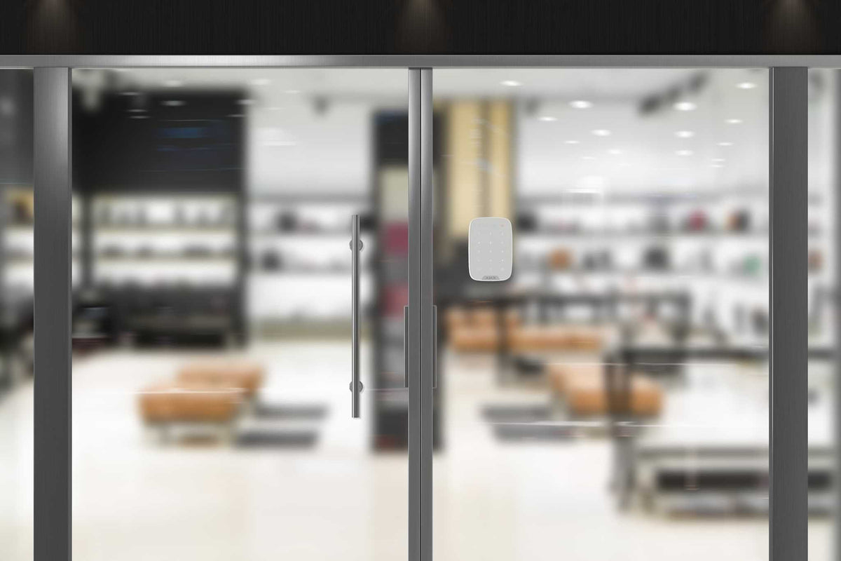 Ajax KeyPad Wireless — White shown in use