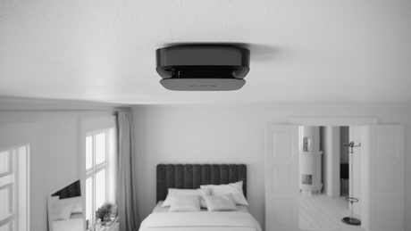 Ajax FireProtect 2 SB (Heat/Smoke/CO) Detector — Black shown in use
