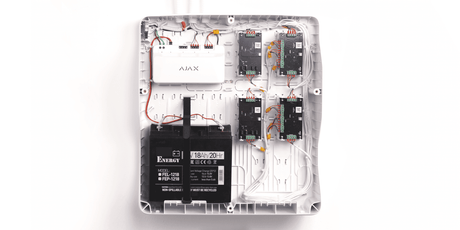 Ajax LineSupply Fibra (45W) — White shown in use