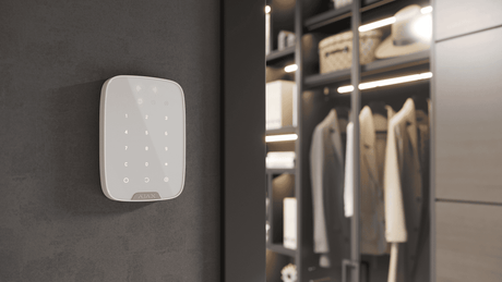 Ajax KeyPad Plus Wireless — White shown in use