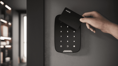 Ajax KeyPad Plus Wireless — Black shown in use